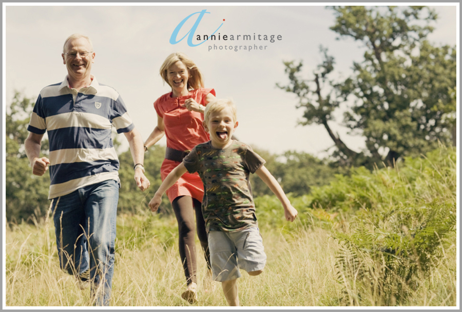 Family running in the park on a photography shoot
